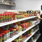 Nagwa Wankey stands in aisle